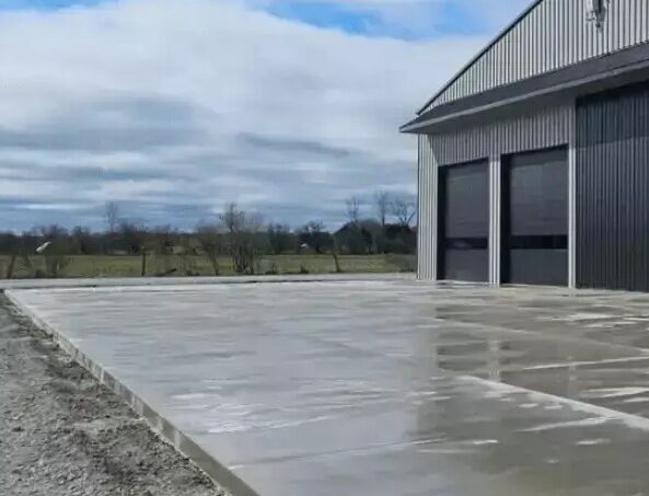 Concrete apron in front of an industrial shed
